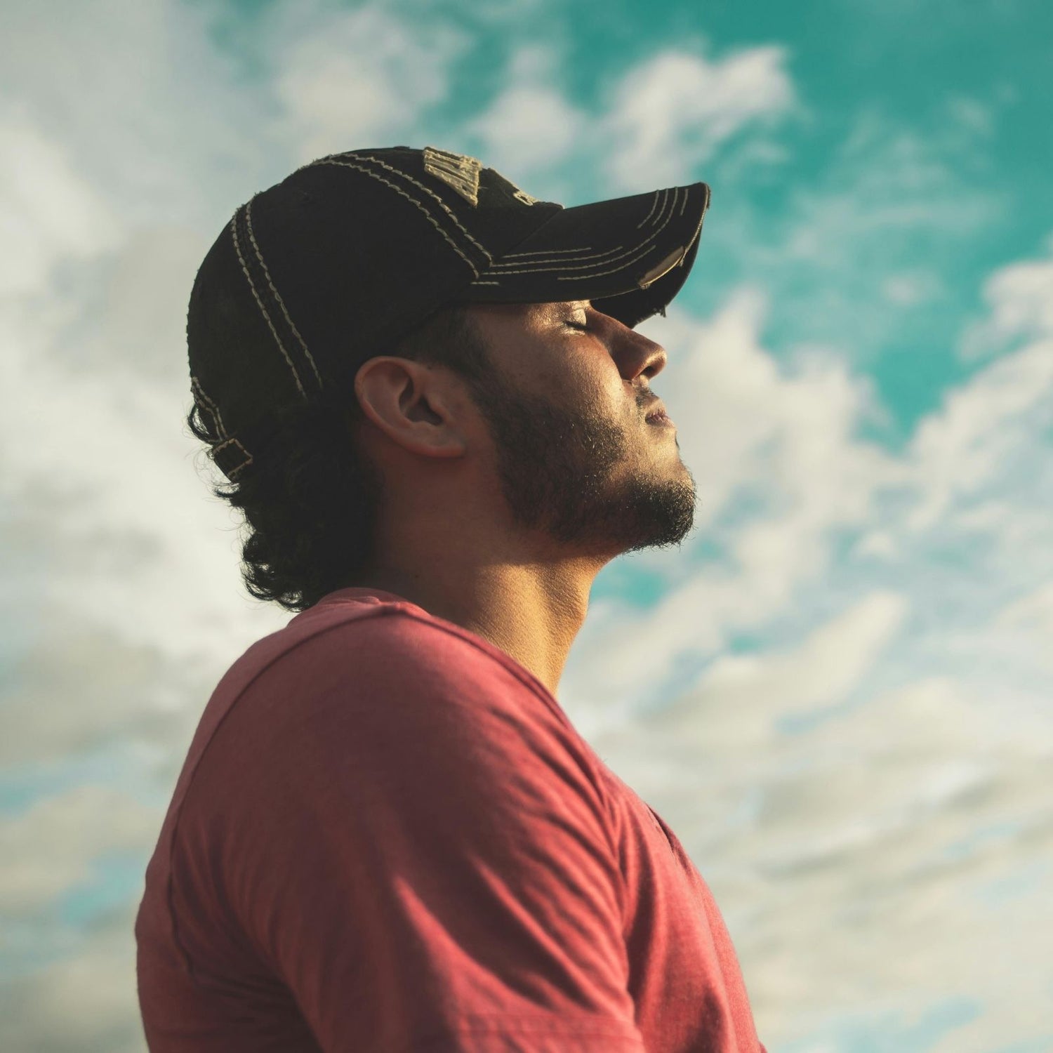 Man practising breathwork and nasal breathing outside